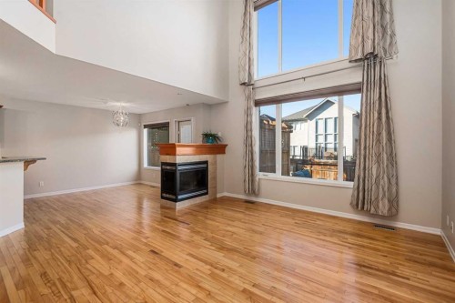 38 Autumn Gardens Se, Calgary, AB - Indoor Photo Showing Other Room With Fireplace