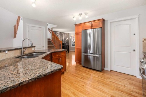38 Autumn Gardens Se, Calgary, AB - Indoor Photo Showing Kitchen With Double Sink