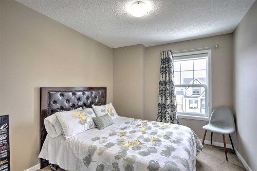 388 Auburn Crest Way Se, Calgary, AB - Indoor Photo Showing Bedroom
