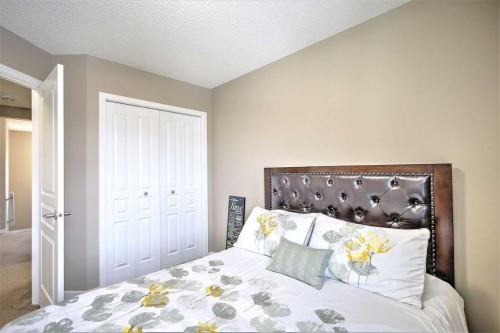 388 Auburn Crest Way Se, Calgary, AB - Indoor Photo Showing Bedroom