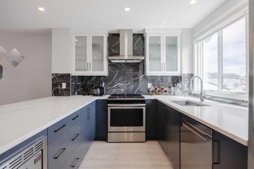 190 Magnolia Square Se, Calgary, AB - Indoor Photo Showing Kitchen With Upgraded Kitchen