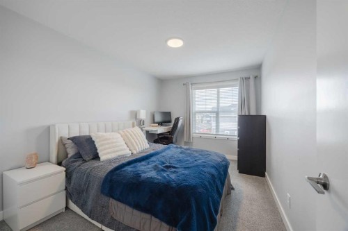 190 Magnolia Square Se, Calgary, AB - Indoor Photo Showing Bedroom