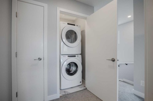 190 Magnolia Square Se, Calgary, AB - Indoor Photo Showing Laundry Room
