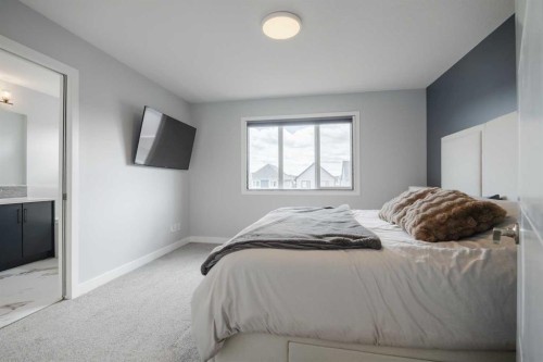 190 Magnolia Square Se, Calgary, AB - Indoor Photo Showing Bedroom
