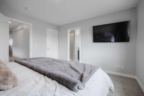 190 Magnolia Square Se, Calgary, AB - Indoor Photo Showing Bedroom