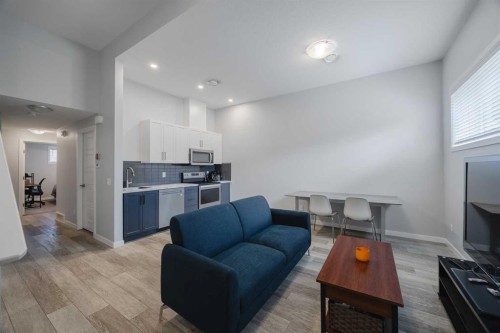 190 Magnolia Square Se, Calgary, AB - Indoor Photo Showing Living Room