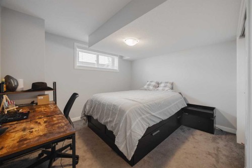 190 Magnolia Square Se, Calgary, AB - Indoor Photo Showing Bedroom