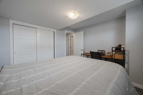 190 Magnolia Square Se, Calgary, AB - Indoor Photo Showing Bedroom