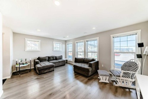 1434-7451 Falconridge Boulevard Ne, Calgary, AB - Indoor Photo Showing Living Room