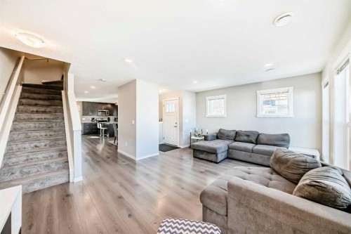 1434-7451 Falconridge Boulevard Ne, Calgary, AB - Indoor Photo Showing Living Room