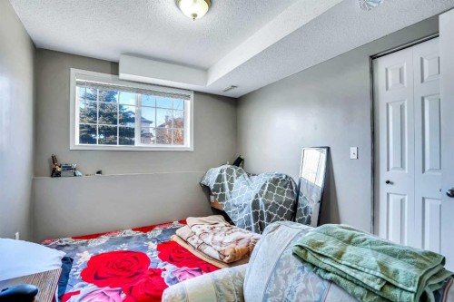 54 Taracove Road Ne, Calgary, AB - Indoor Photo Showing Bedroom