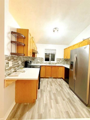 54 Taracove Road Ne, Calgary, AB - Indoor Photo Showing Kitchen