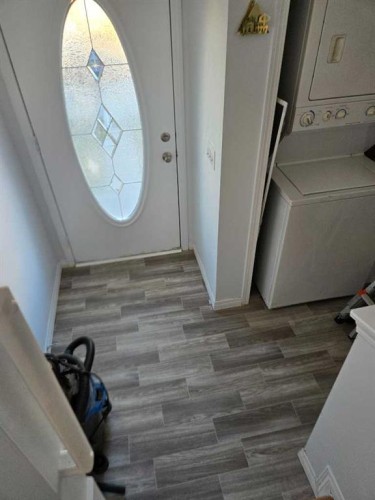 54 Taracove Road Ne, Calgary, AB - Indoor Photo Showing Laundry Room