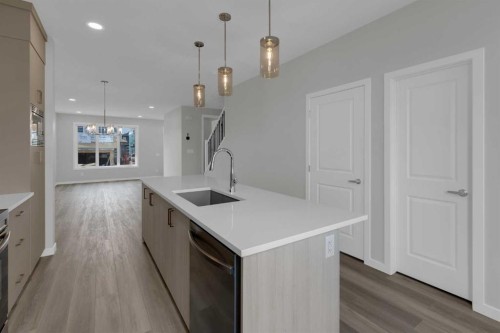 2022 Cobblebrook Crescent Sw, Airdrie, AB - Indoor Photo Showing Kitchen With Upgraded Kitchen