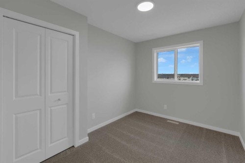 2022 Cobblebrook Crescent Sw, Airdrie, AB - Indoor Photo Showing Other Room