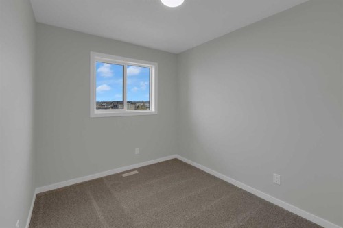 2022 Cobblebrook Crescent Sw, Airdrie, AB - Indoor Photo Showing Other Room