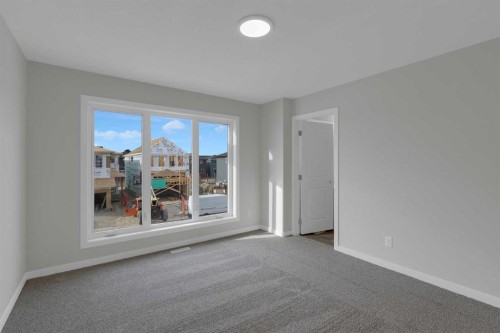 2022 Cobblebrook Crescent Sw, Airdrie, AB - Indoor Photo Showing Other Room
