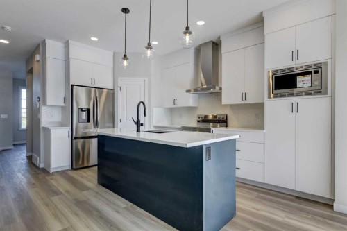 125 Setonvista Gate Se, Calgary, AB - Indoor Photo Showing Kitchen With Upgraded Kitchen