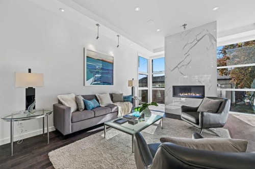2115 Bowness Road Nw, Calgary, AB - Indoor Photo Showing Living Room With Fireplace