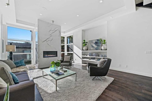 2115 Bowness Road Nw, Calgary, AB - Indoor Photo Showing Living Room With Fireplace