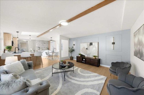 210 Erin Woods Circle Se, Calgary, AB - Indoor Photo Showing Living Room