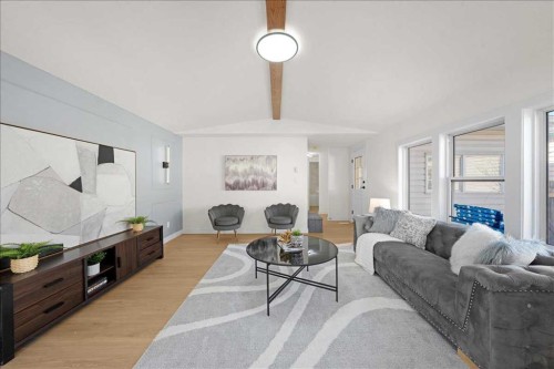 210 Erin Woods Circle Se, Calgary, AB - Indoor Photo Showing Living Room