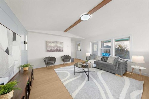 210 Erin Woods Circle Se, Calgary, AB - Indoor Photo Showing Living Room