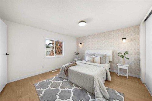 210 Erin Woods Circle Se, Calgary, AB - Indoor Photo Showing Bedroom