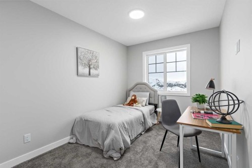943 Legacy Circle Se, Calgary, AB - Indoor Photo Showing Bedroom