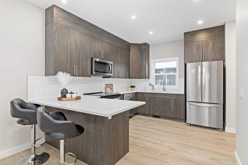 943 Legacy Circle Se, Calgary, AB - Indoor Photo Showing Kitchen With Stainless Steel Kitchen With Upgraded Kitchen