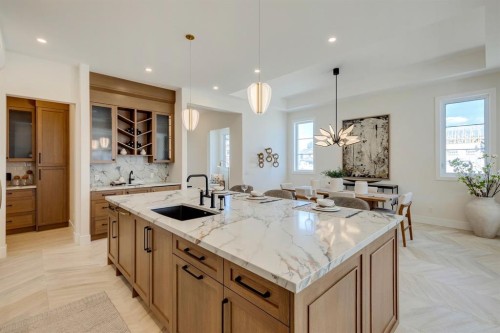 8 Calais Lane Sw, Calgary, AB - Indoor Photo Showing Kitchen With Upgraded Kitchen