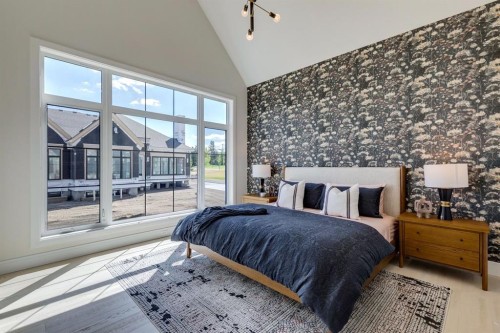 8 Calais Lane Sw, Calgary, AB - Indoor Photo Showing Bedroom