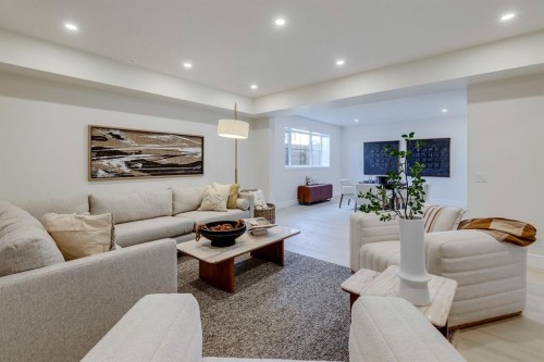 8 Calais Lane Sw, Calgary, AB - Indoor Photo Showing Living Room
