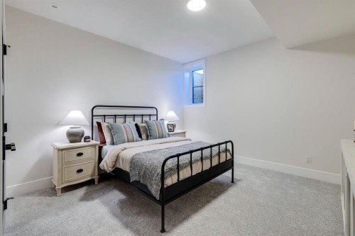 8 Calais Lane Sw, Calgary, AB - Indoor Photo Showing Bedroom