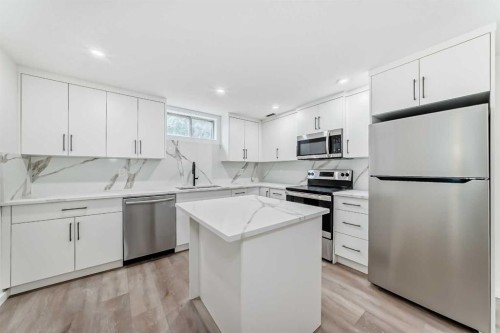 64 Woodstock Road Sw, Calgary, AB - Indoor Photo Showing Kitchen With Stainless Steel Kitchen With Upgraded Kitchen