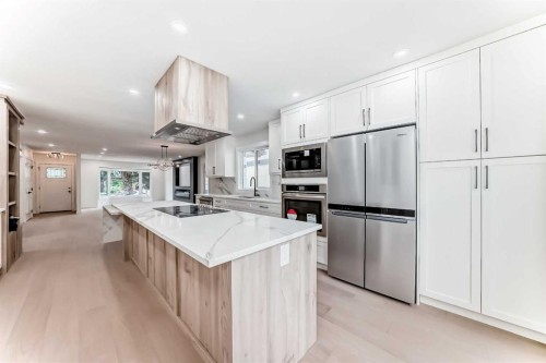 64 Woodstock Road Sw, Calgary, AB - Indoor Photo Showing Kitchen With Stainless Steel Kitchen With Upgraded Kitchen