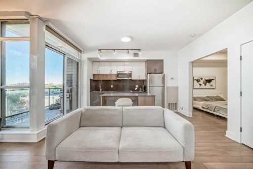 423-619 Confluence Way Se, Calgary, AB - Indoor Photo Showing Living Room