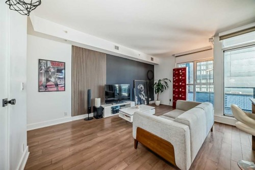423-619 Confluence Way Se, Calgary, AB - Indoor Photo Showing Living Room