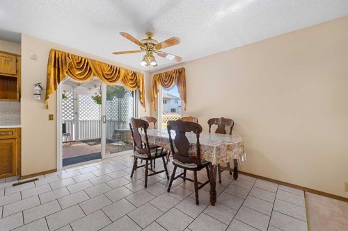 91 Coral Springs Boulevard Ne, Calgary, AB - Indoor Photo Showing Dining Room