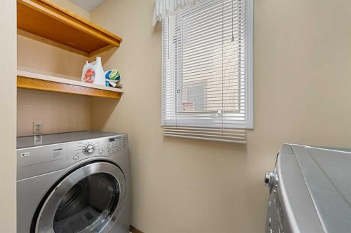 91 Coral Springs Boulevard Ne, Calgary, AB - Indoor Photo Showing Laundry Room