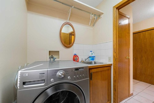 91 Coral Springs Boulevard Ne, Calgary, AB - Indoor Photo Showing Laundry Room