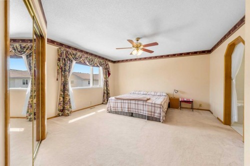 91 Coral Springs Boulevard Ne, Calgary, AB - Indoor Photo Showing Bedroom