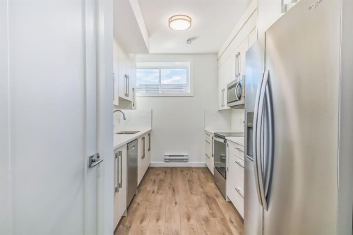 7654 202 Avenue Se, Calgary, AB - Indoor Photo Showing Kitchen With Upgraded Kitchen