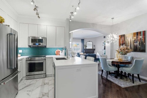 404-881 15 Avenue Sw, Calgary, AB - Indoor Photo Showing Kitchen With Stainless Steel Kitchen With Upgraded Kitchen