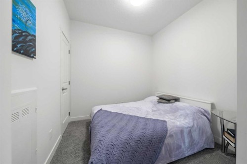 34-25 Auburn Meadows Avenue Se, Calgary, AB - Indoor Photo Showing Bedroom