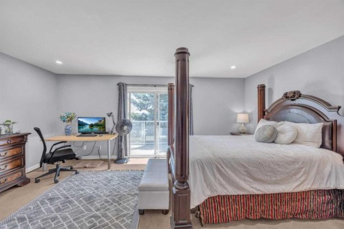 303 Ranchridge Bay Nw, Calgary, AB - Indoor Photo Showing Bedroom