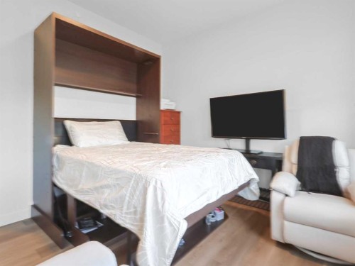 110 Sunstone Way, Balzac, AB - Indoor Photo Showing Bedroom