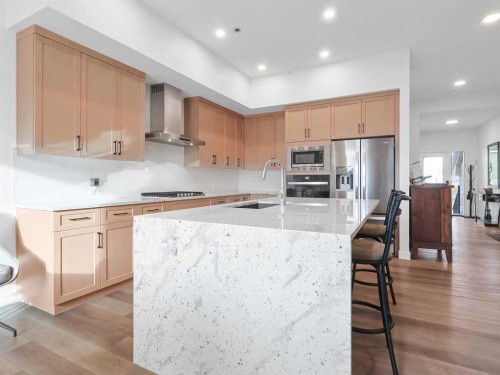 110 Sunstone Way, Balzac, AB - Indoor Photo Showing Kitchen