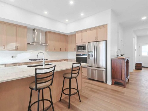 110 Sunstone Way, Balzac, AB - Indoor Photo Showing Kitchen