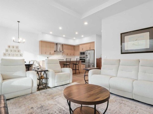 110 Sunstone Way, Balzac, AB - Indoor Photo Showing Living Room